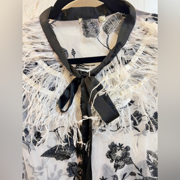 White sheer black floral top with black satin bow ribbon at neck w/ feathers. - Picture 2 of 5